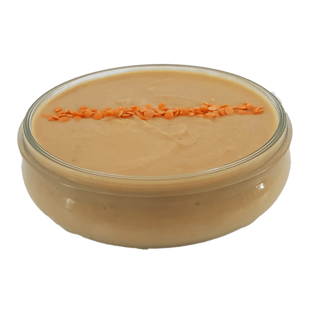 Dessert de lentilles corail à la vanille lyophilisé dans un contenant en verre, adapté pour le camping et les road trips, fabriqué en France.