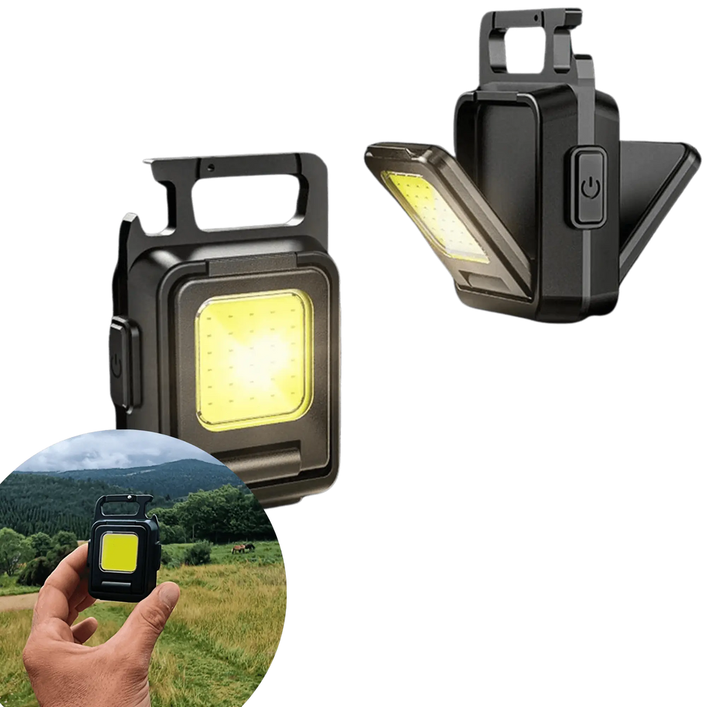 Mini Lampe de Poche ultrapuissante LED affichée dans un cadre naturel, compact et idéale pour les aventures nocturnes.