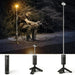 Lampe LED télescopique rechargeable portable pour le camping, utilisée par un pêcheur, solution d'éclairage extérieur polyvalente.