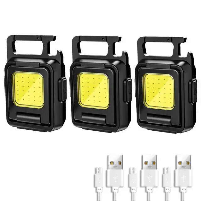 Set of three compact ultrapuissant LED flashlights with USB charging cables, ideal for night adventures.