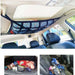 Sac de rangement pour toit de voiture avec design en mesh fixé au plafond, optimisant l'espace du véhicule pour un rangement sécurisé des objets pendant le voyage.