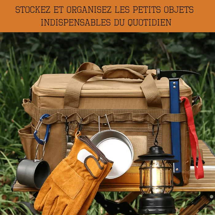 Sac de rangement pour le camping avec outils, gants, lanterne et gamelle, idéal pour organiser les objets essentiels du quotidien.