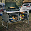 cuisine de camping pliante, meuble cuisine camping, table camping avec rangement, armoire camping pliable, cuisine outdoor portable, table de camping aluminium, meuble vanlife cuisine, équipement camping cuisine, table barbecue extérieure