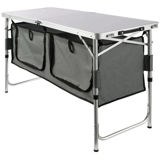 cuisine de camping pliante, meuble cuisine camping, table camping avec rangement, armoire camping pliable, cuisine outdoor portable, table de camping aluminium, meuble vanlife cuisine, équipement camping cuisine, table barbecue extérieure