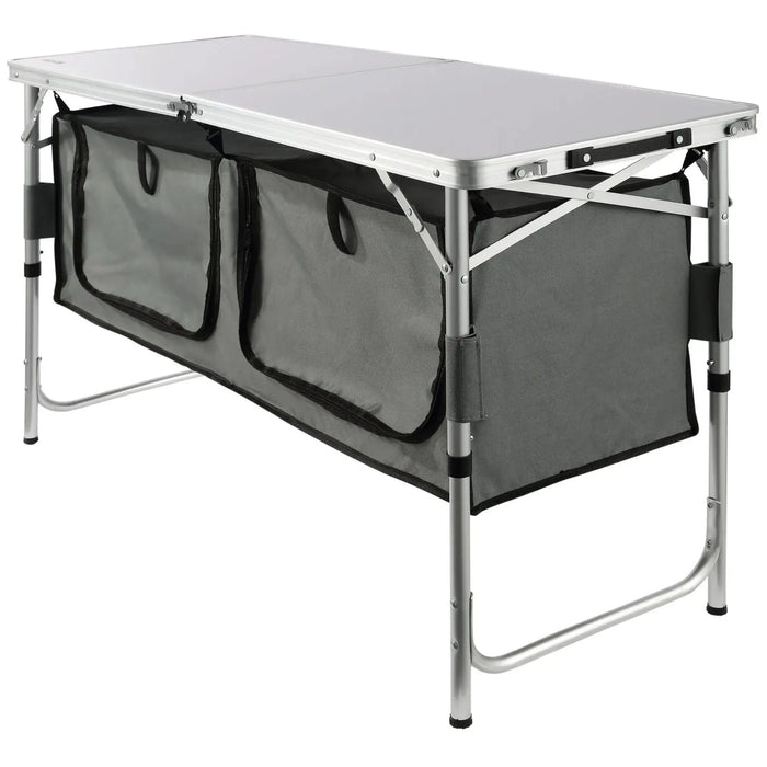 cuisine de camping pliante, meuble cuisine camping, table camping avec rangement, armoire camping pliable, cuisine outdoor portable, table de camping aluminium, meuble vanlife cuisine, équipement camping cuisine, table barbecue extérieure