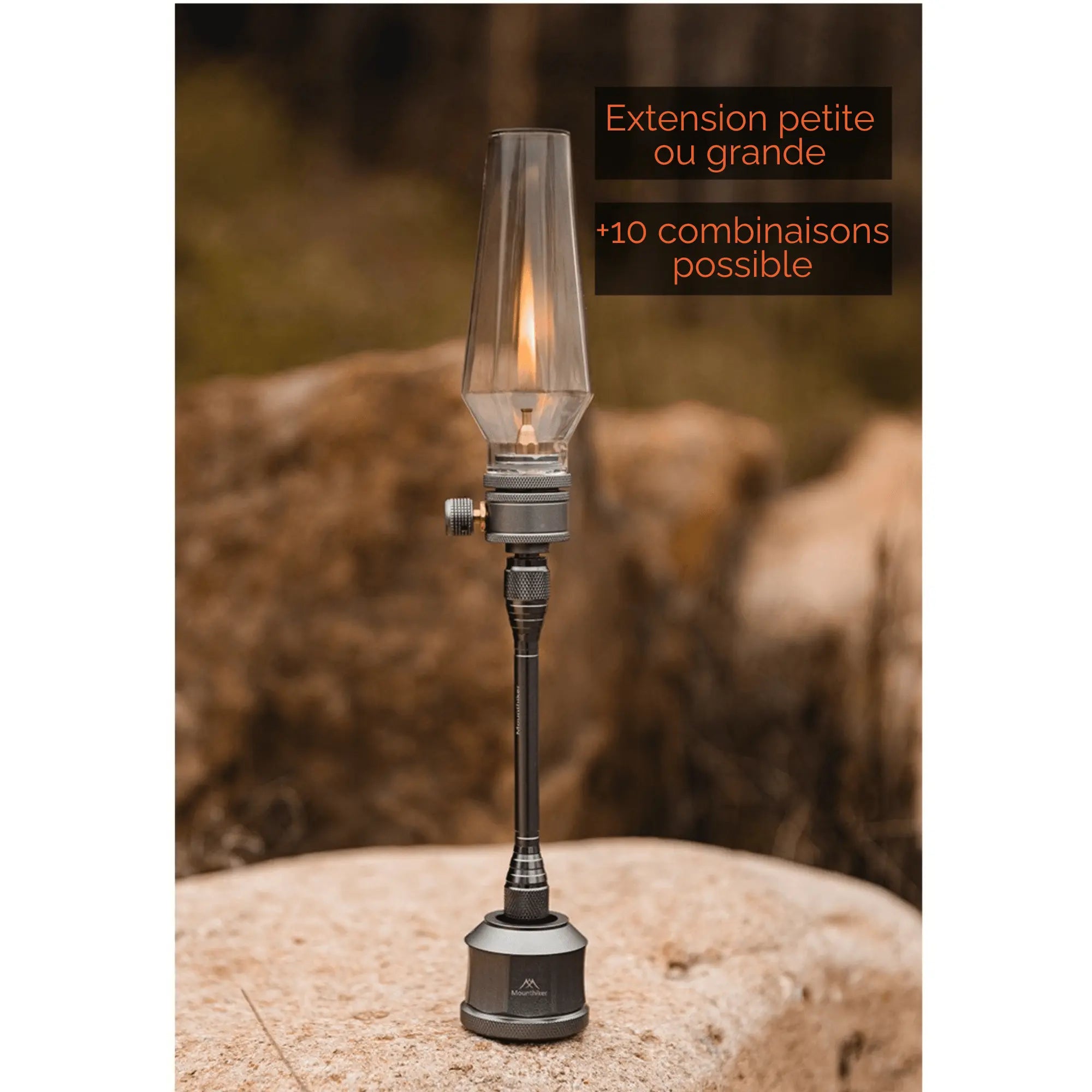 Rechargeable camping gas lantern on rock, customizable for outdoor adventures, with warm and authentic lighting.