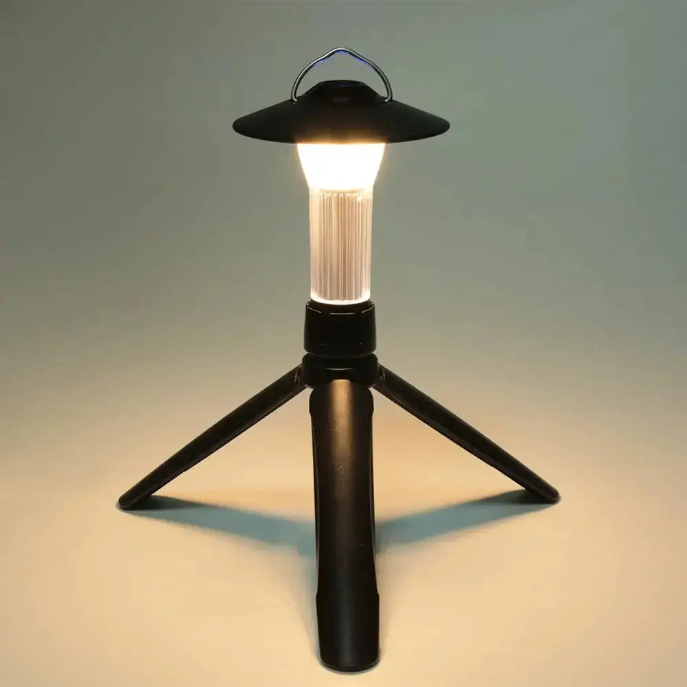 Multifunction rechargeable solar USB camping lantern with LED lights and tripod design, ideal for outdoor adventures and illumination.