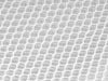 Gros plan sur la texture de la fibre de bambou respirante pour un matelas anti-condensation utilisé dans les tentes de toit.
