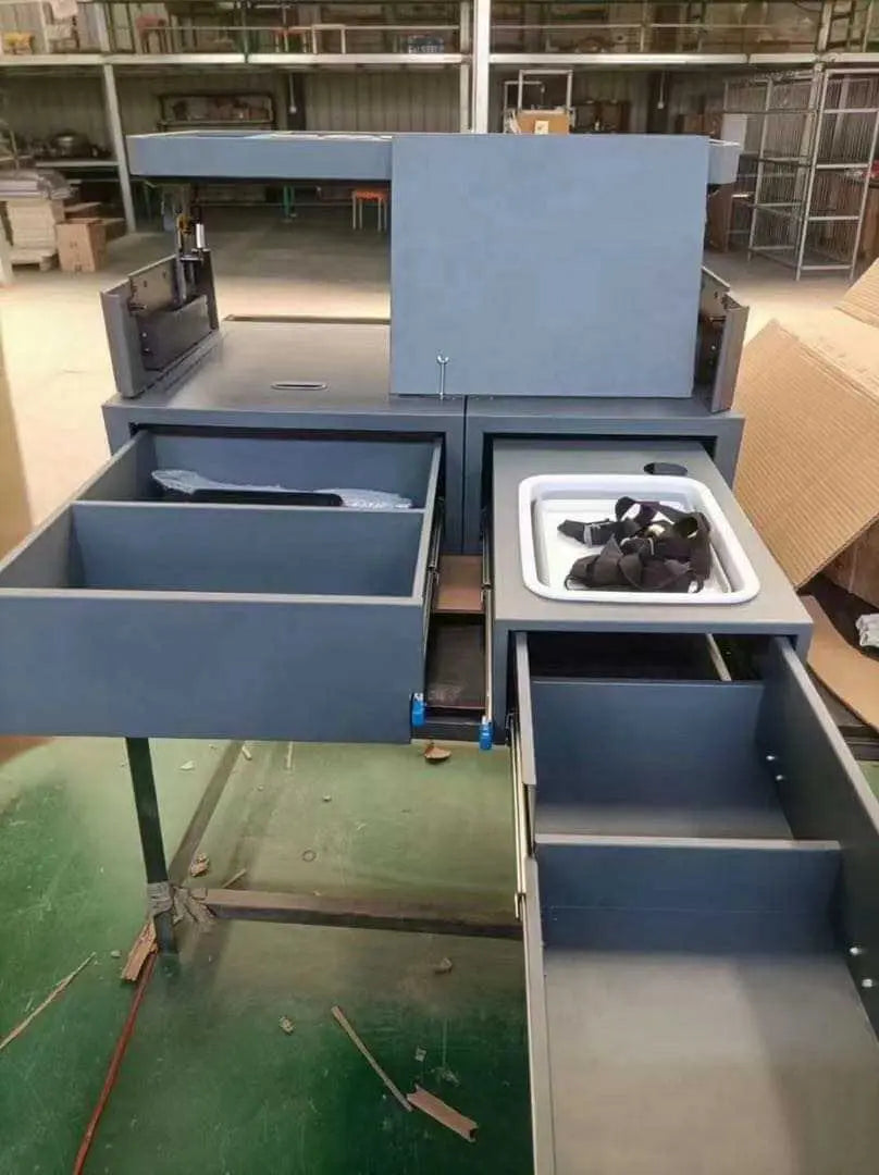 Multiple dark blue industrial drawers with ball bearing slides, partially open showing construction and storage potential.