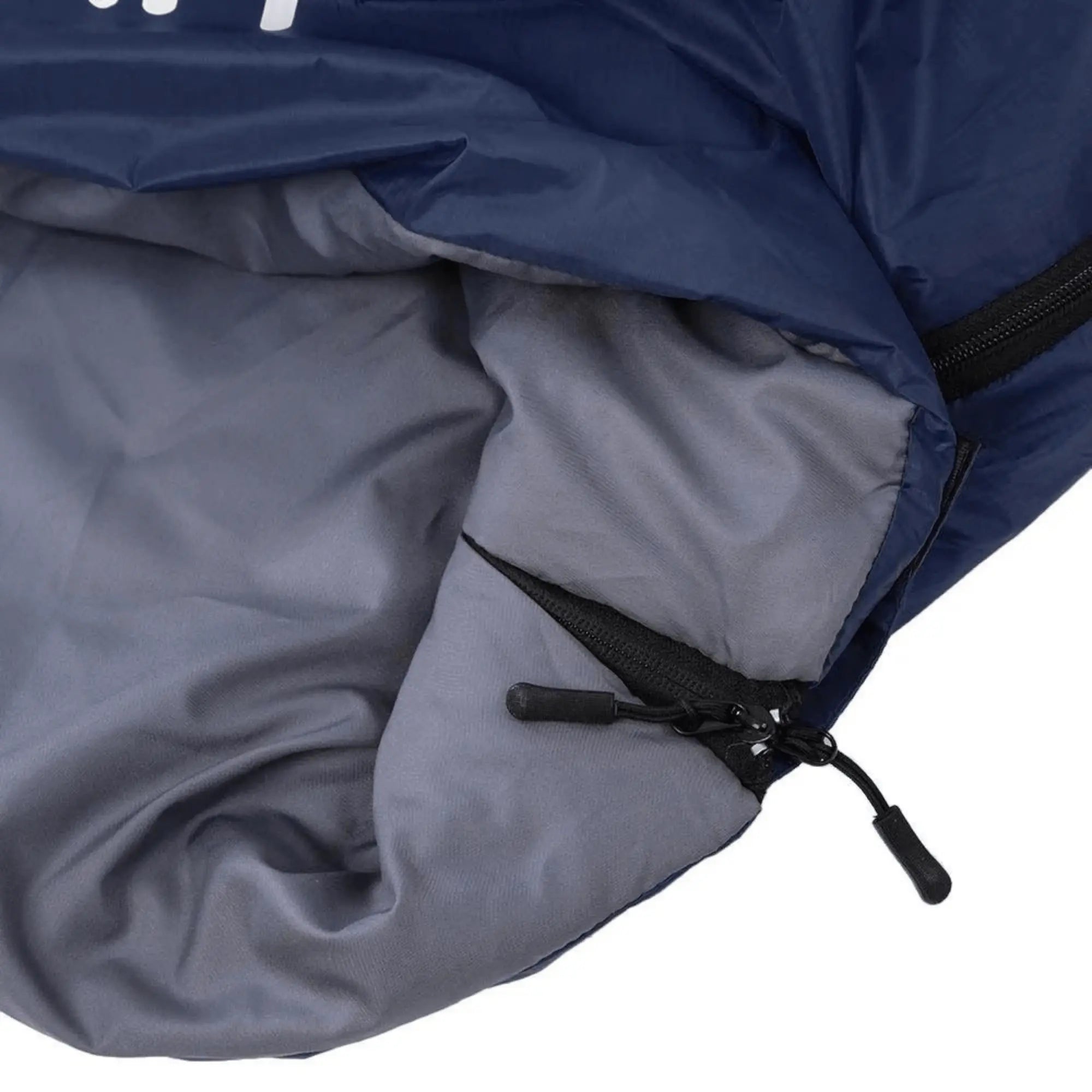 Close-up of ultralight outdoor sleeping bag with natural down filling and zipper, ideal for hiking and camping.