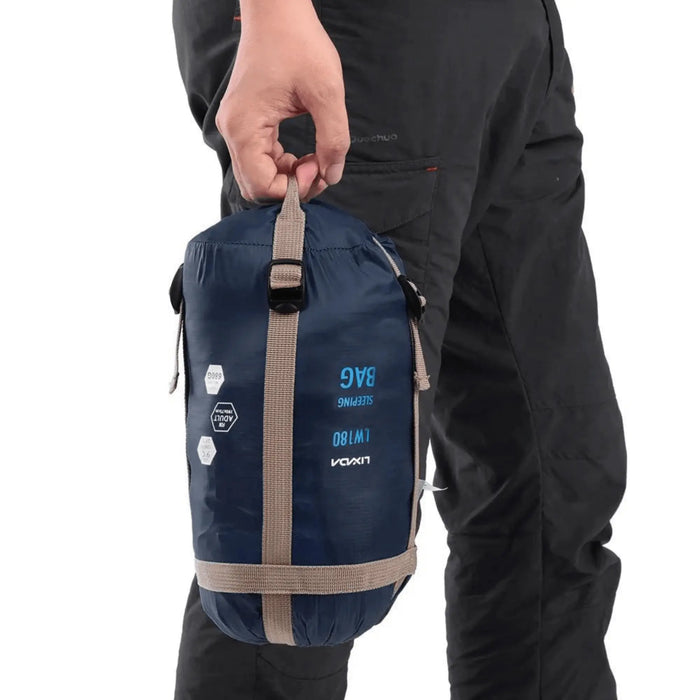 Sac de couchage ultraléger enveloppant 190x75 cm pour l'extérieur, facilement transportable à la main, idéal pour le camping.