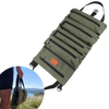 Sac de rangement pliable avec compartiments modulables, idéal pour le camping et les voyages, vu en plein air en utilisation.