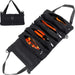 Sac de rangement pliable noir avec compartiments ouverts, outils orange visibles, pour l'organisation de voyage et de camping.