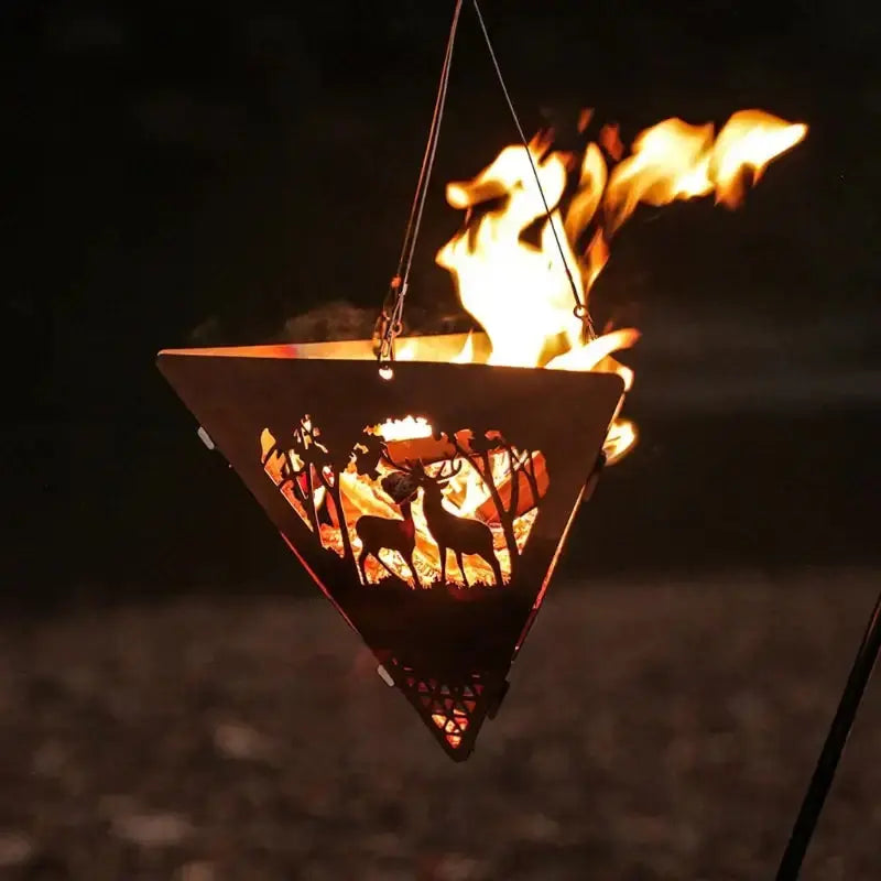 Triangular campfire suspension with deer design, stainless steel frame, portable and durable, ideal for camping and outdoor cooking.