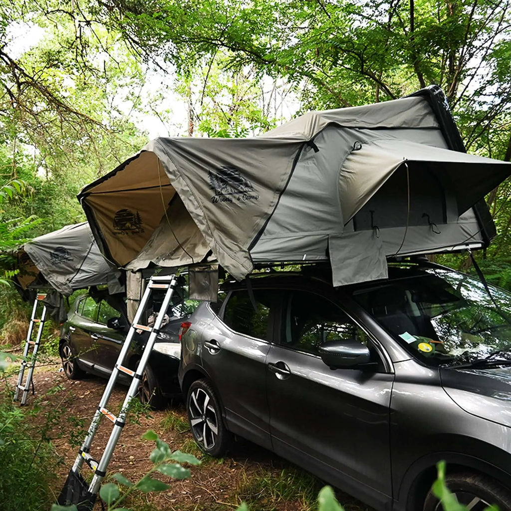 Hard-shell rooftop tent XXL for 4-5 people, set up on car in forest - ideal for family camping and outdoor adventures.