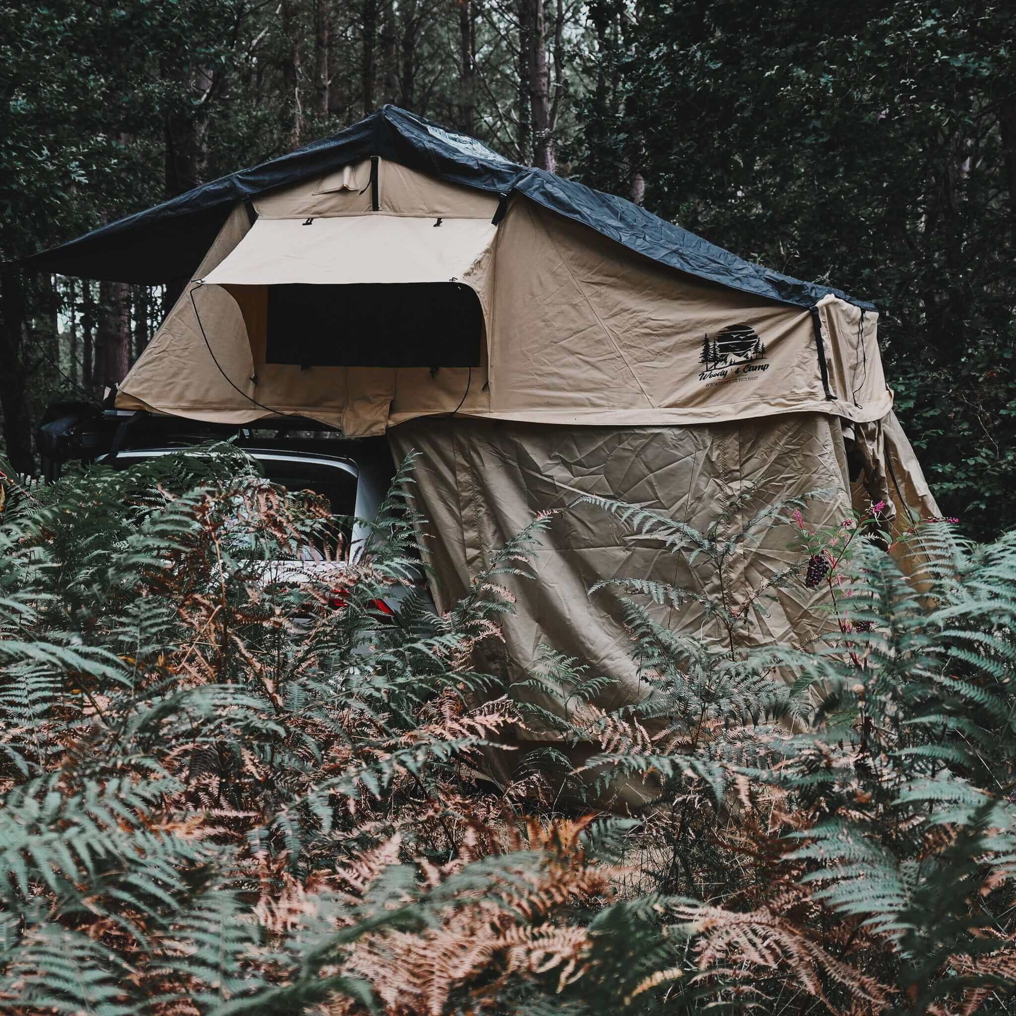 Roof tent and annex setup in forest, special pre-order for 2025 season, accommodates 5 people, early bird offer ends 31/10/2024.