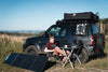 Panneau solaire pliable Bluetti PV200 en camping nature