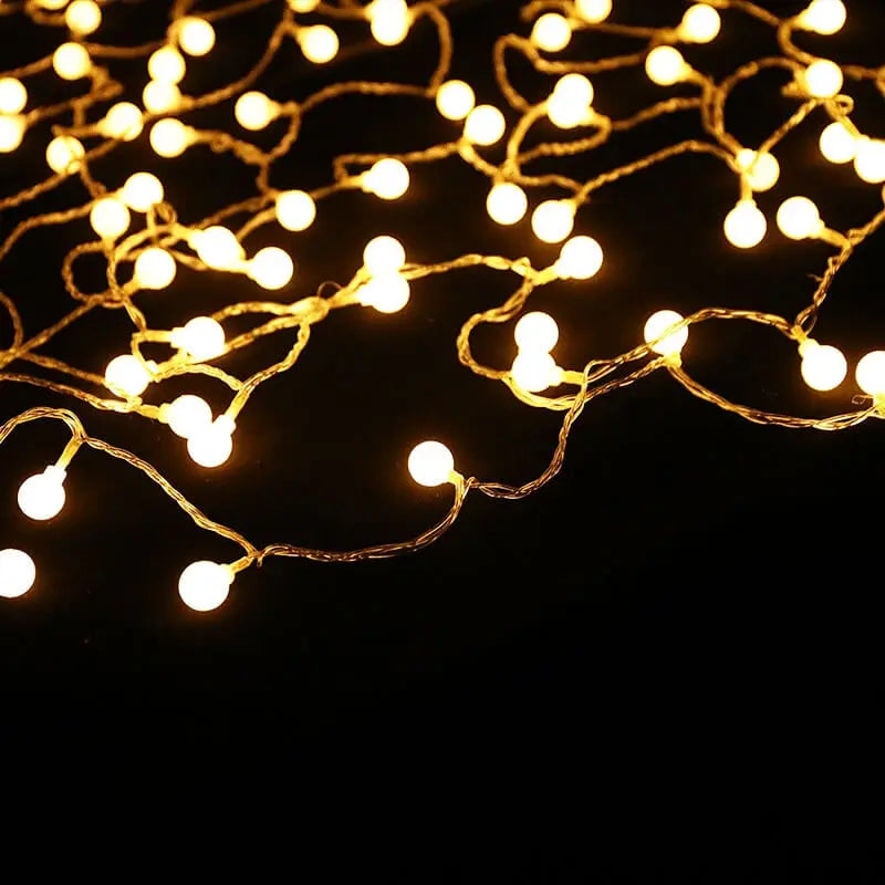 LED camping string lights with warm illumination, designed for outdoor tent use, perfect for solar or USB charging.