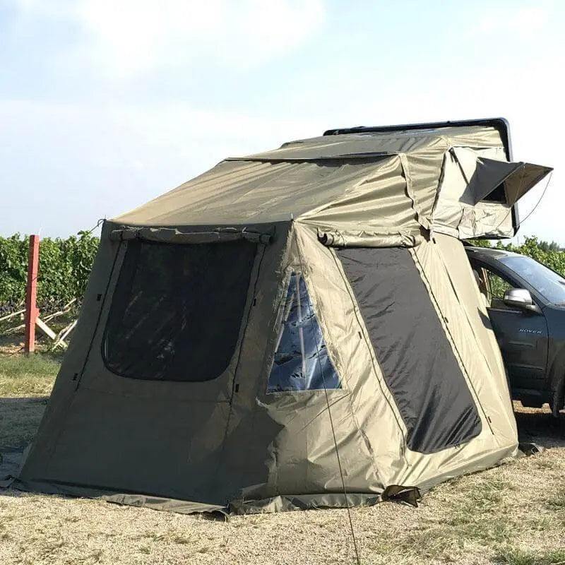 Rigide roof tent annex for 2-3 persons attached to SUV, offering extra living space and comfort for outdoor adventures.